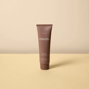 A single tube of Barossa Hand Cream standing upright on a light beige surface against a matching beige background.