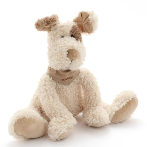 Buddy the Dog soft toy in cream and honey coloured plush fabric. Buddy is wearing a neck bandana embroidered with his name.