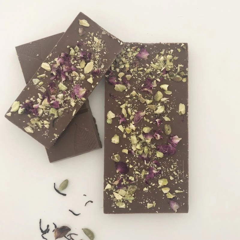 Artisan milk chocolate, chai tea, pistachio and rose petals.