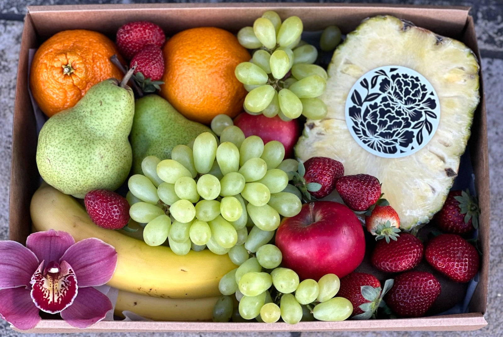Fruit hamper with a delicious selection of fresh seasonal fruit.