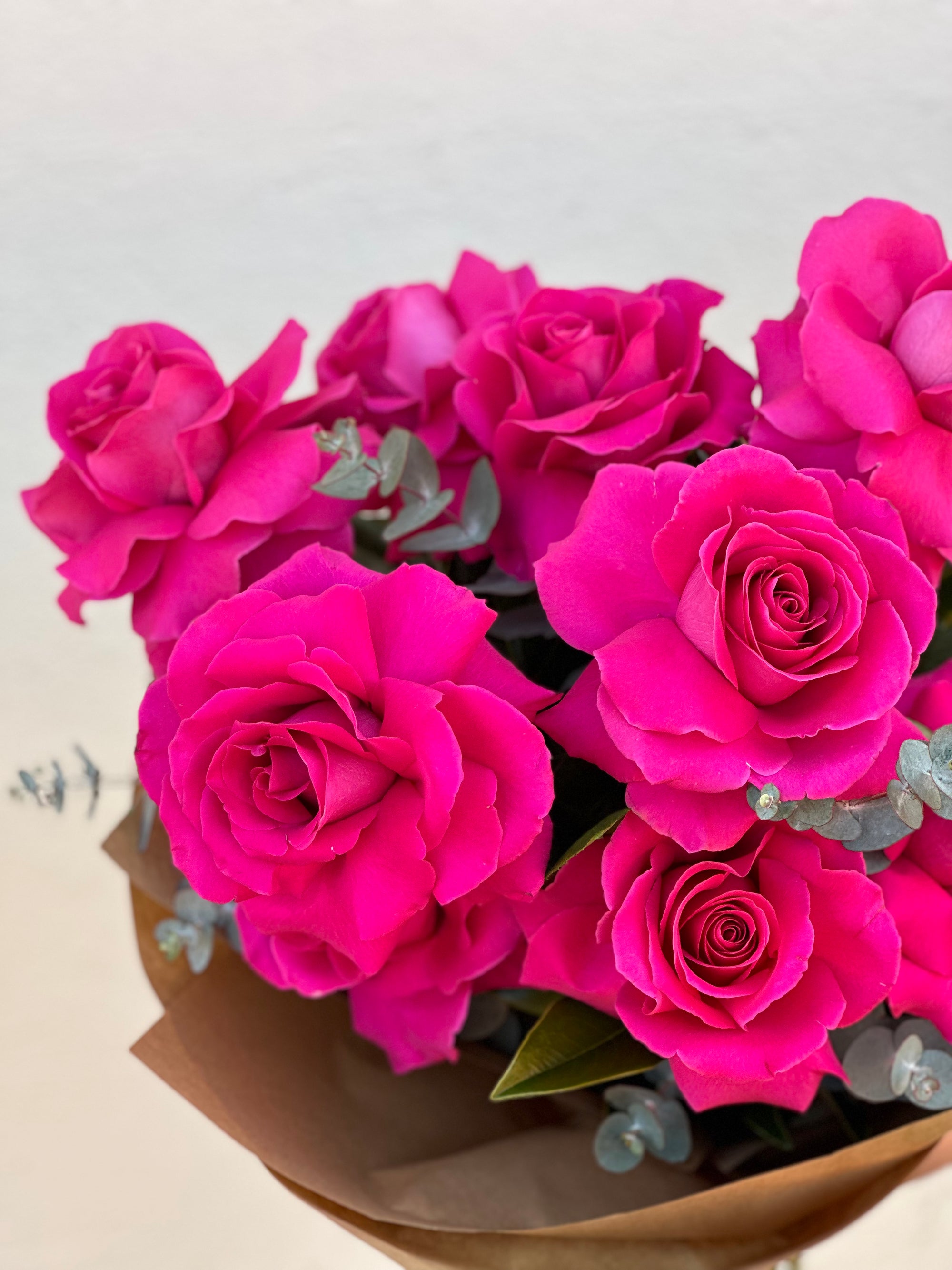 Rose bouquets equal love, romance and passion. Select a bouquet of these stunning blooms from a choice of 6 stems,10 stems or 12 stems. Available in red, white, pink or florist's choice. 