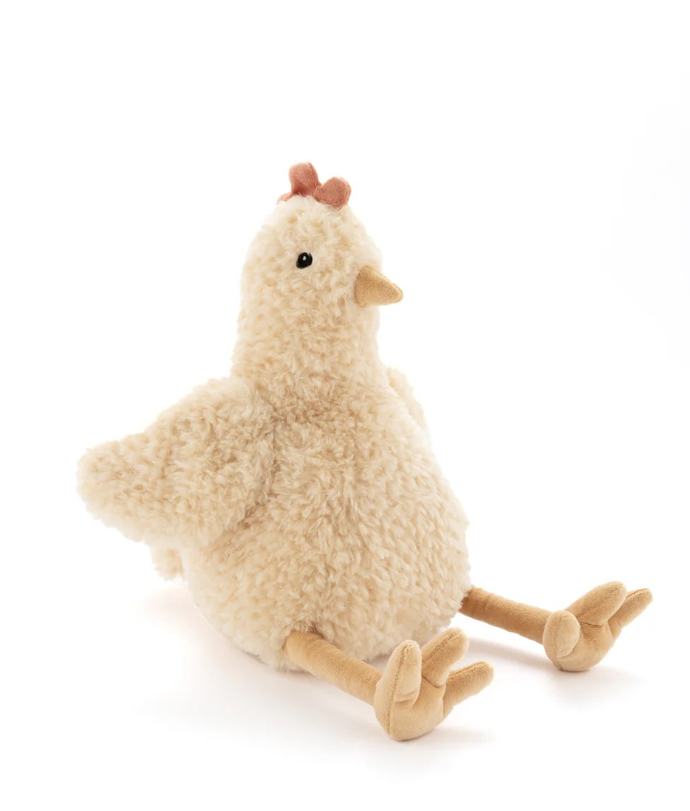 Plush toy chicken on a white background