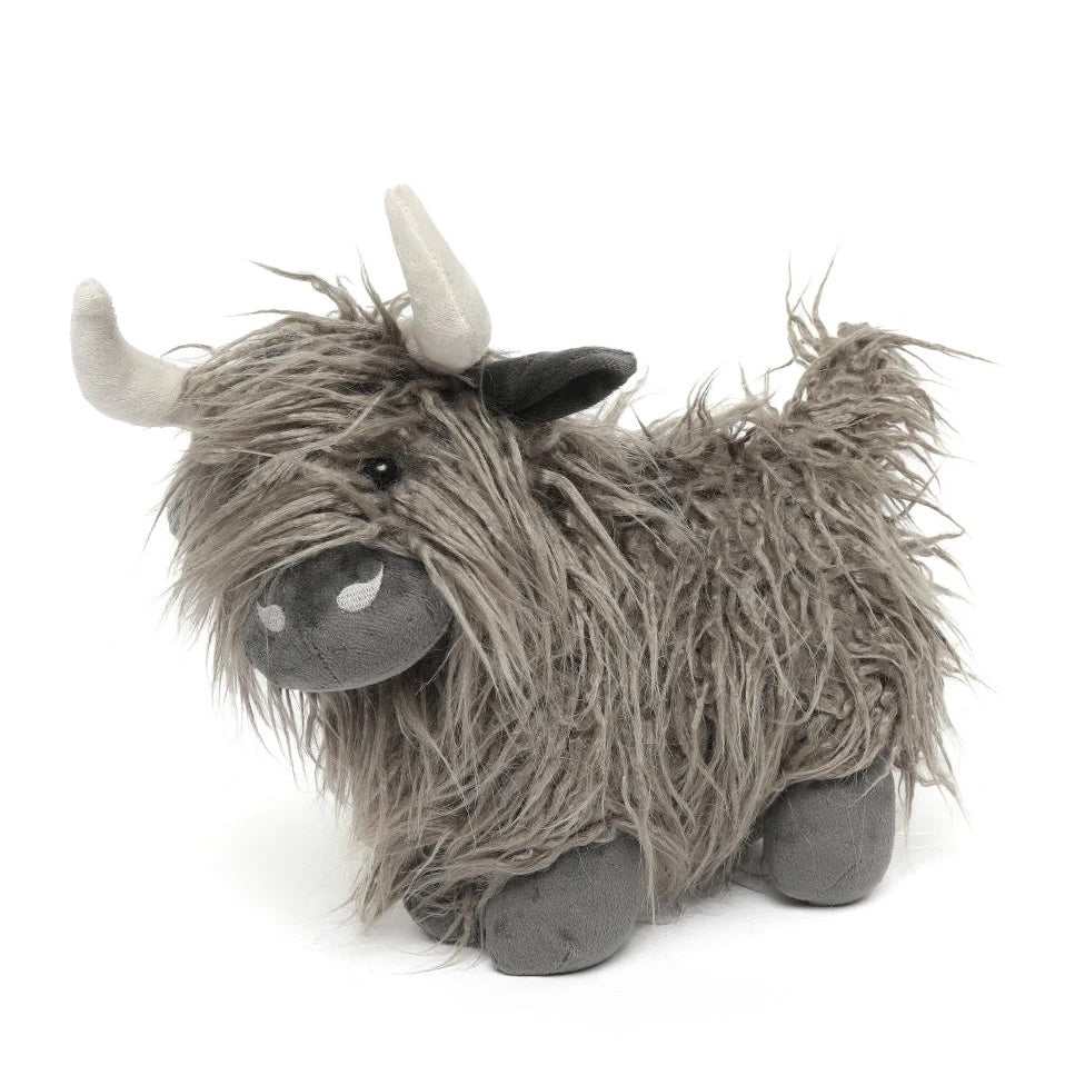 Soft toy in the shape of a female Highland cow.