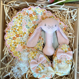 Pink baby hamper, beautifully presented in an eco-display gift box. Includes a selection of natural beechwood & food grade silicone baby teether, toy cloth stick rattle and T-bar baby booties. 