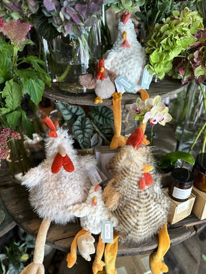 Soft toys, in the shape of Roosters and chickens.
