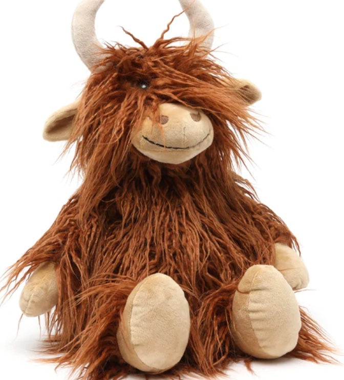 Soft toy in the shape of a Highland cow.
